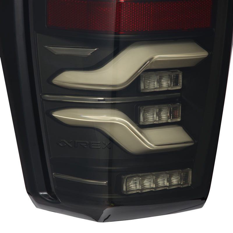 AlphaRex 16-21 Toyota Tacoma LUXX LED Taillights Blk w/Activ Light/Seq Signal - 680090