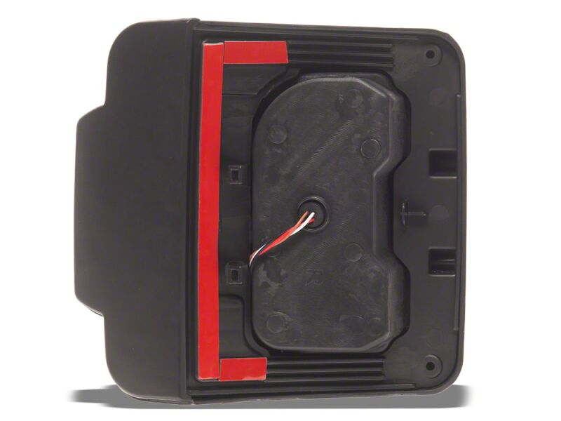 Raxiom 07-18 Jeep Wrangler JK Axial Series JL Style LED Tail Lights- Black Housing- Smoked Lens - J183257 - close-up view