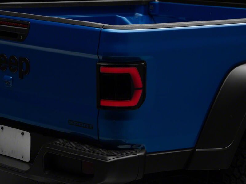 Raxiom 20-26 Jeep Gladiator JT Low Profile LED Tail Lights- Black Housing- Smoked Lens - JG27784 - front view