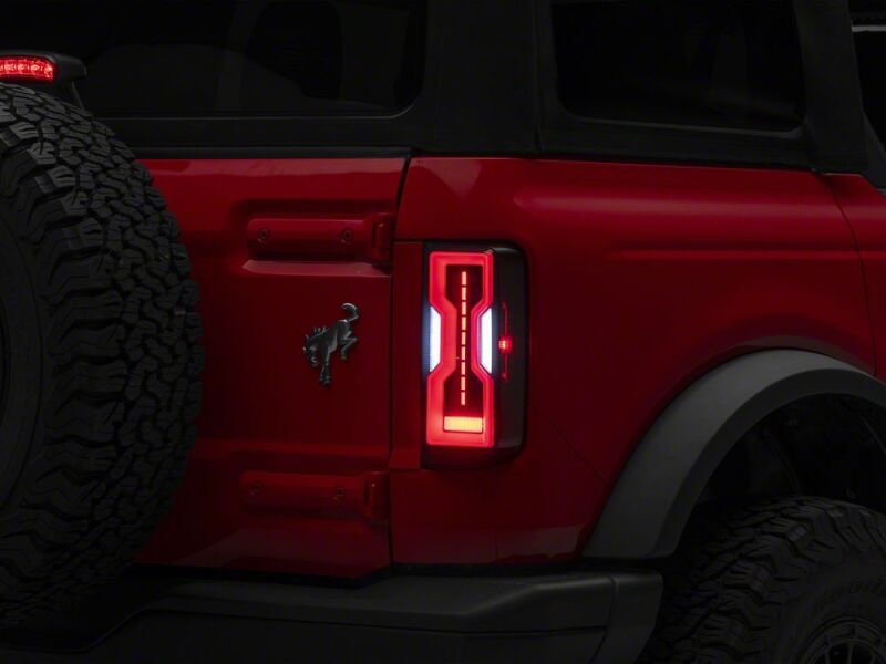 Raxiom 21-26 Ford Bronco Axial Series LED Tail Lights- Black Housing- Smoked Lens - FB37114 - close-up view