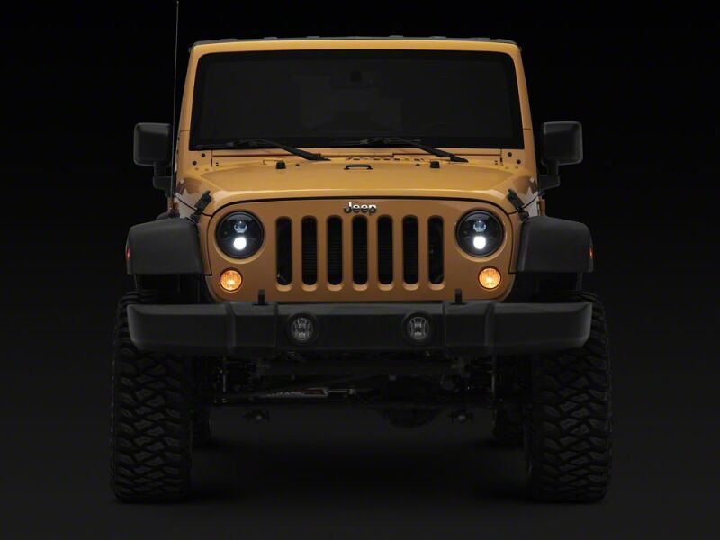 Raxiom 07-18 Jeep Wrangler JK Axial Series DB1 LED Headlights- Black Housing- Clear Lens - J181074 - close-up view 2