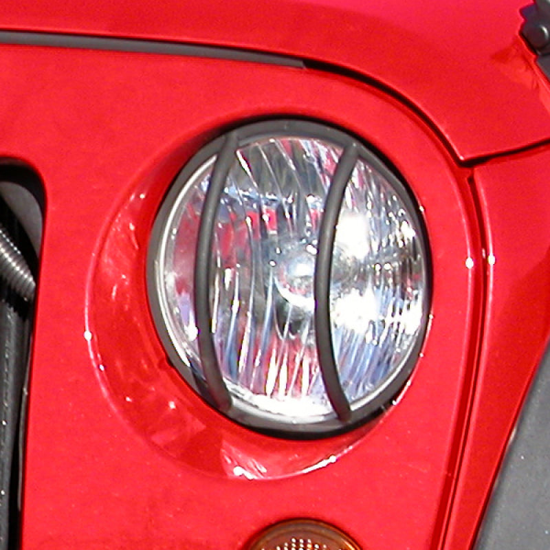 Rugged Ridge 07-18 Jeep Wrangler JK Black Headlight Euro Guards - 11230.03 for 2007-2018 Jeep Wrangler - front view