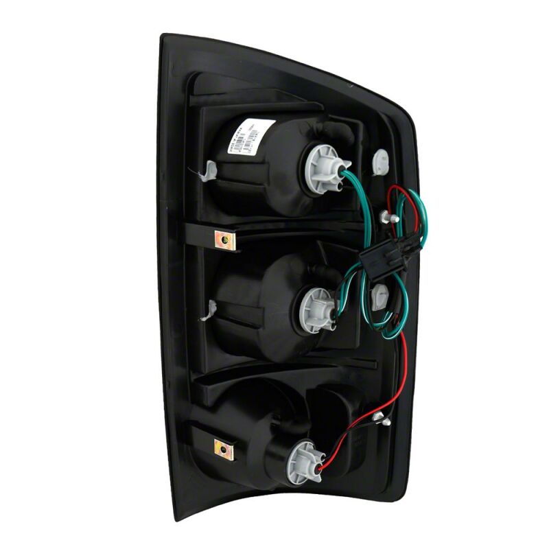 Raxiom 02-05 Dodge RAM 1500 Axial Series Tail Lights- Black Housing- Dark Smoked Lens - R110167 - close-up view