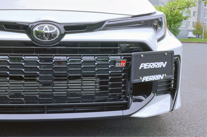 PERRIN 23-24 Toyota GR Corolla License Plate Relocation Kit - PTP-BDY-201 by Perrin Performance - angle view