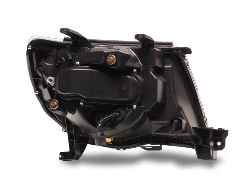 Raxiom 05-11 Toyota Tacoma Axial Series Switchback Projector Headlights- Black Housing- Clear Lens - TT23361 - detail view