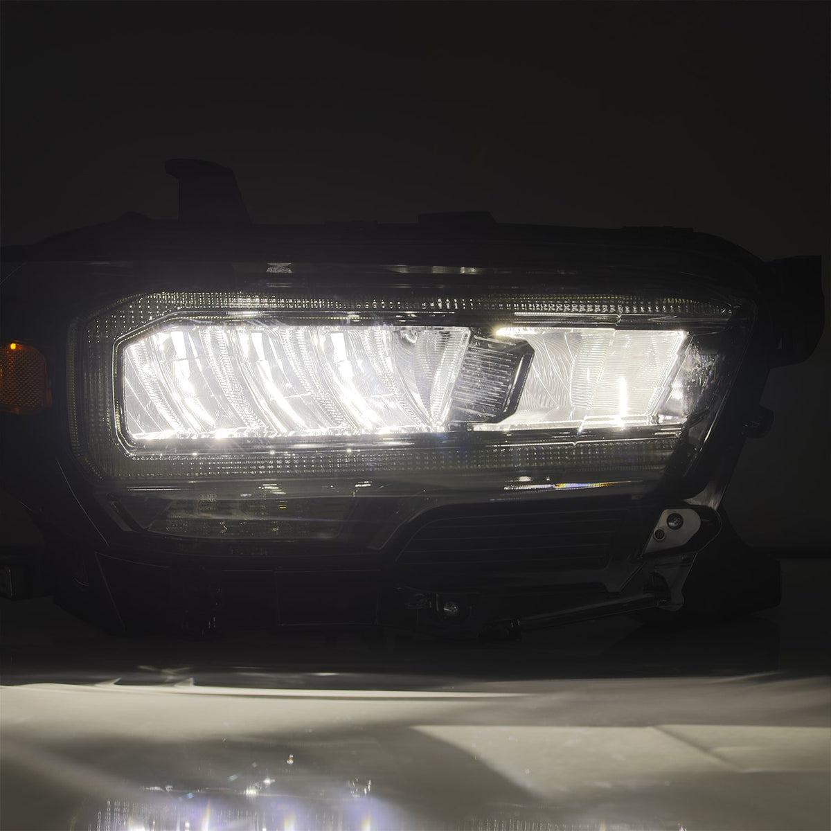 AlphaRex 16-23 Toyota Tacoma LUXX-Series LED Crystal Headlights - Alpha-Black - 880702 for 2016-2023 Toyota Tacoma - close-up