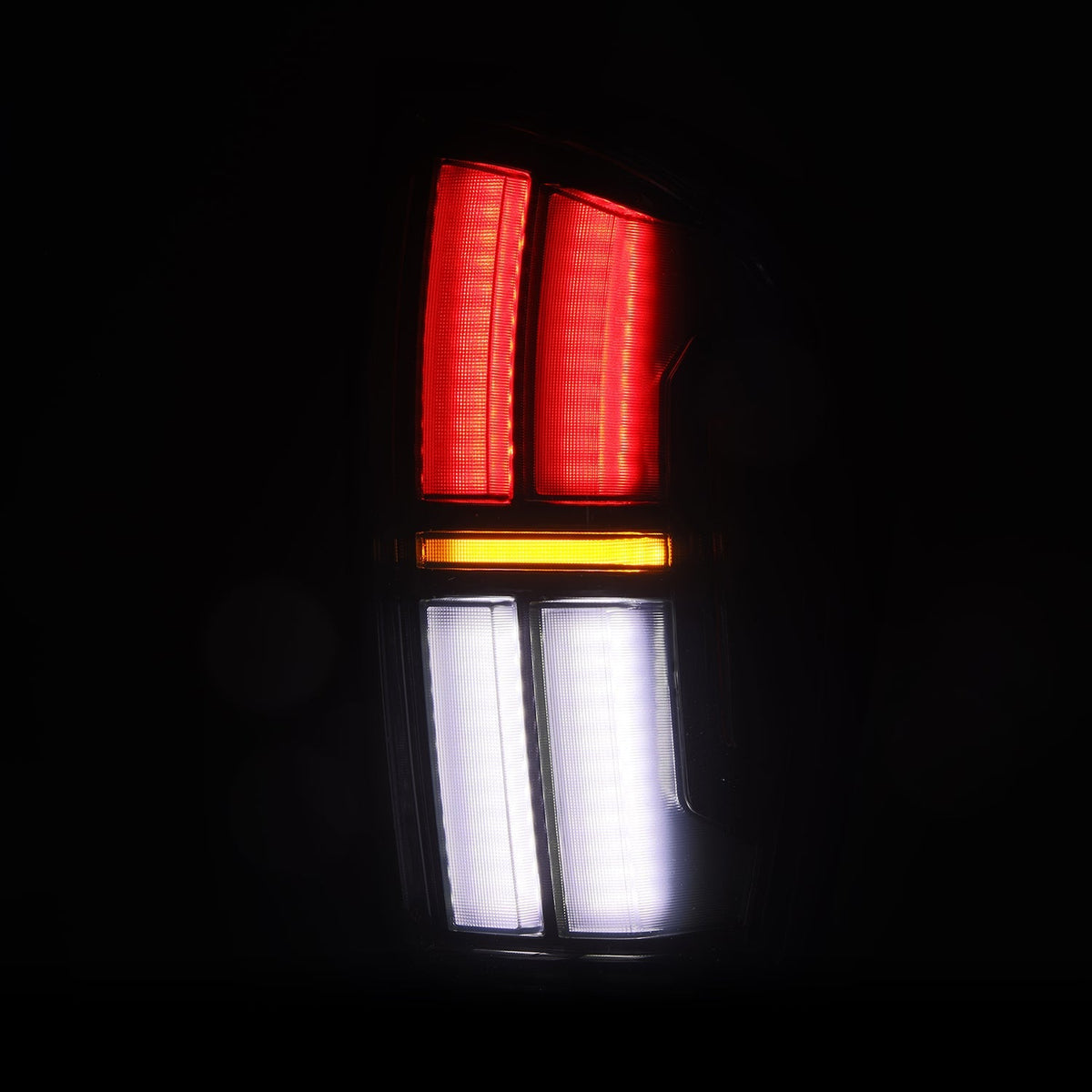 AlphaRex 16-23 Toyota Tacoma/Tundra NOVA-Series Prismatic LED Tail Lights Black - 680082 for 2016-2023 Toyota Tacoma - rear v