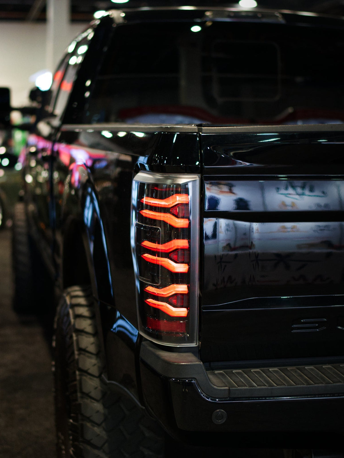 AlphaRex 17-19 Ford F150/F250/F350 LUXX LED Taillights - Black - 659091 for 2017-2019 Ford F 150 - side view