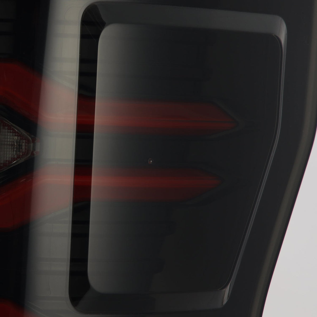 AlphaRex 17-19 Ford F150/F250/F350 LUXX LED Taillights - Black-Red - 659092 for 2017-2019 Ford F 150 - side view