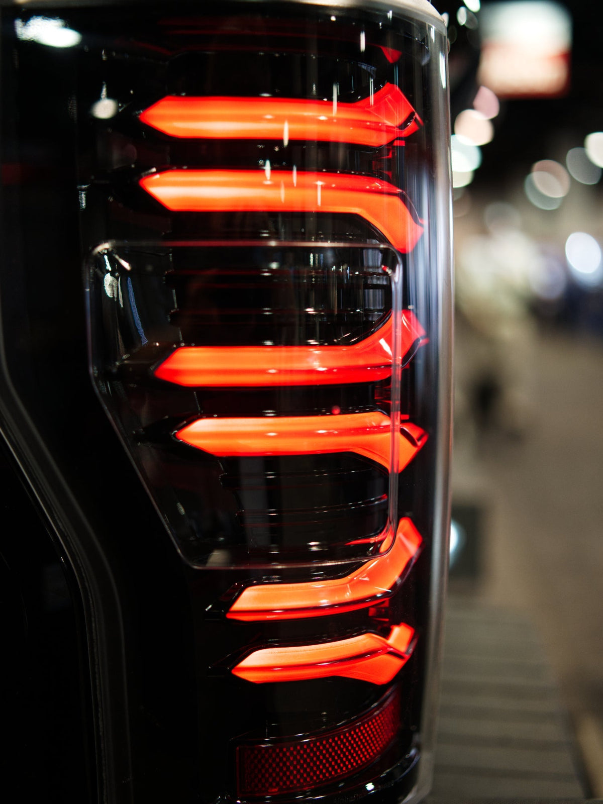 AlphaRex 17-19 Ford F150/F250/F350 LUXX LED Taillights - Black-Red - 659092 for 2017-2019 Ford F 150 - rear view