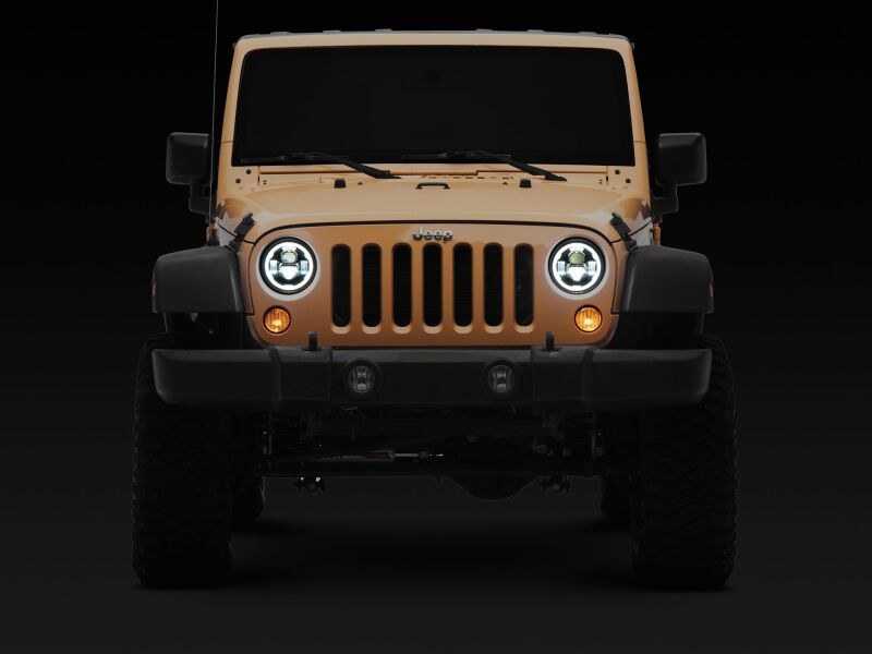 Raxiom 07-18 Jeep Wrangler Axial Series 7-Inch LED Headlights w DRL/ Black Housing - Clear Lens - J178741 - front view