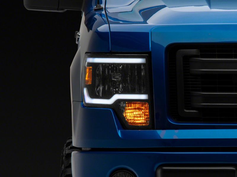 Raxiom 09-14 Ford F-150 Axial Series Headlight w/ SEQL LED Bar- Blk Housing (Clear Lens) - T566368