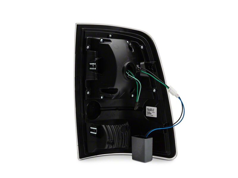 Raxiom 09-18 Dodge RAM 1500 LED Tail Lights- Black Housing- Clear Lens - R110154 - close-up view 2