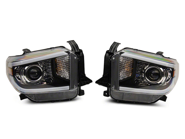 Raxiom 14-21 Toyota Tundra Axial Projector Headlights w/ SEQL LED Bar- Blk Housing (Clear Lens) - TU16011 for 2014-2021 Toyot