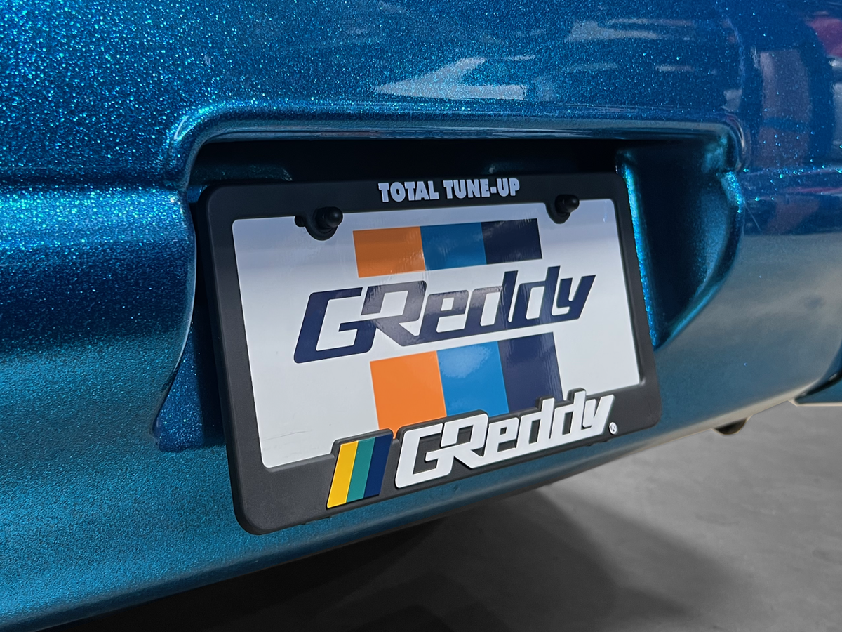 GReddy - GReddy Total Tune Up License Plate Frame - "Black-out" or "Color" - 21112001