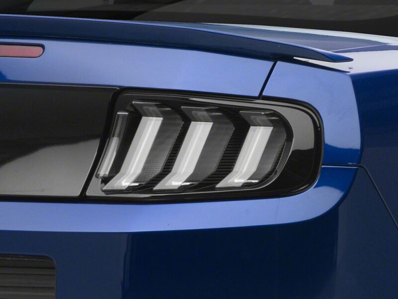 Raxiom 13-14 Ford Mustang CXR Series LED Tail Lights- Black Housing- Smoked Lens - 441705 - close-up view 2