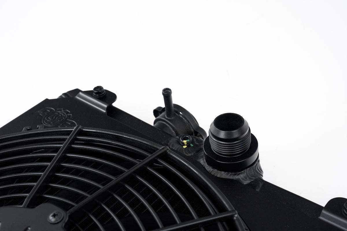 CSF Universal Half Radiator w/-16AN & Slip-On Fittings/12in SPAL Fan & Shroud - Black Finish - 2858XB