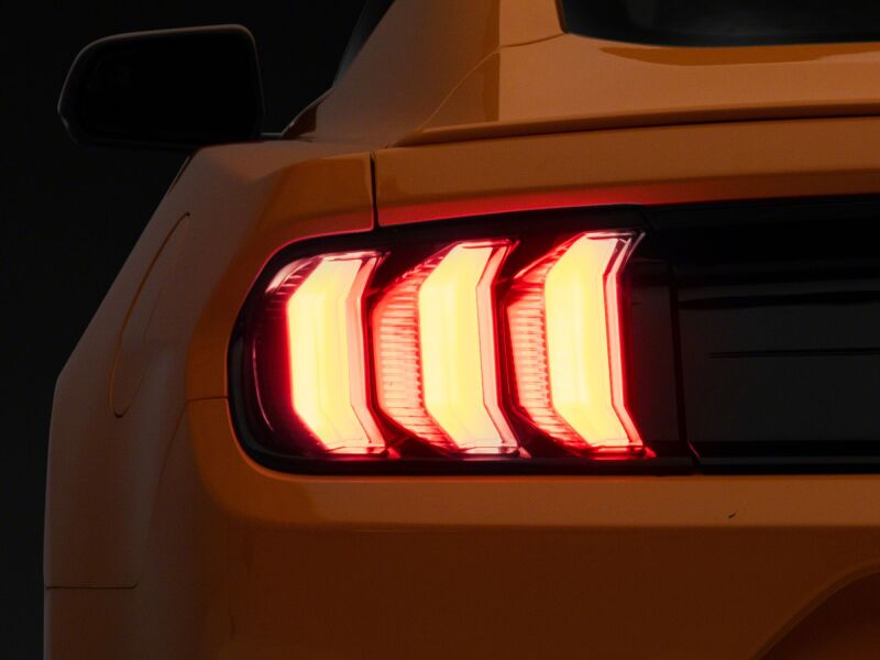 Raxiom 15-23 Ford Mustang Euro Style LED Tail Lights- Gloss Black Housing- Red Lens - 412123 - side view