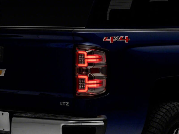 Raxiom 14-18 Chevrolet Silverado 1500 LED Tail Lights/Seq Turn Signals- Chrome- Clear Lens - S114459 - front view