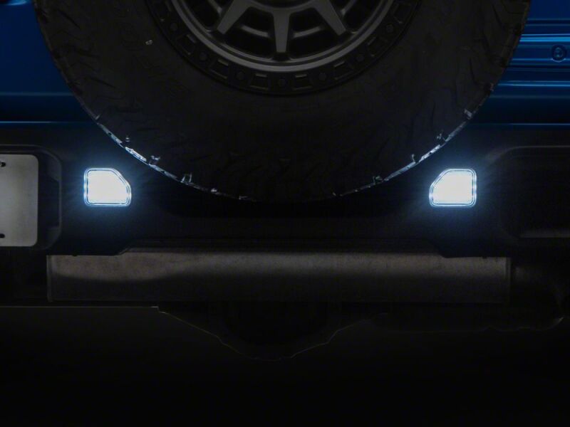 Raxiom 18-26 Jeep Wrangler JL Clear LED Rear Bumper Reflector Lights- White LED - J238247 - front view