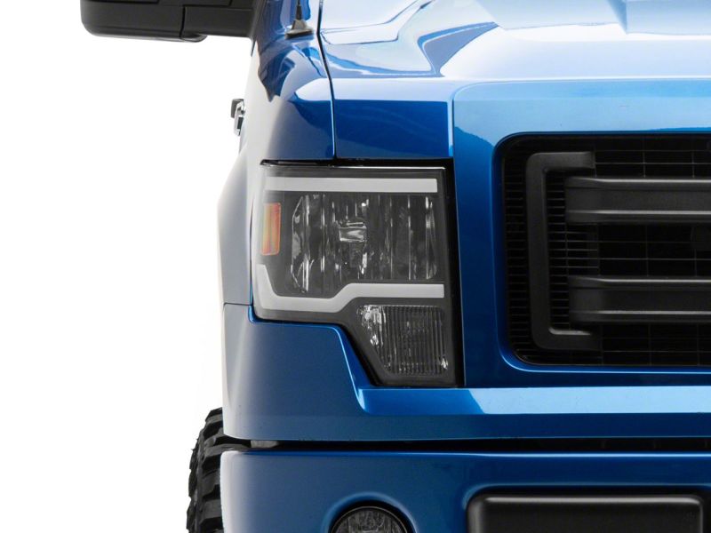 Raxiom 09-14 Ford F-150 Axial Series Headlight w/ SEQL LED Bar- Blk Housing (Clear Lens) - T566368
