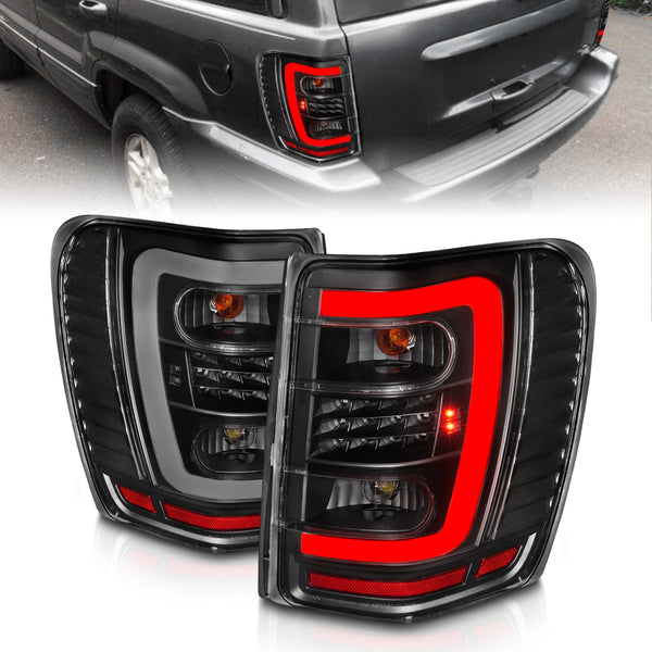 ANZO 1999-2004 Jeep Grand Cherokee LED Tail Lights w/ Light Bar Black Housing Clear Lens - 311394 for 1999-2004 Jeep Grand Ch