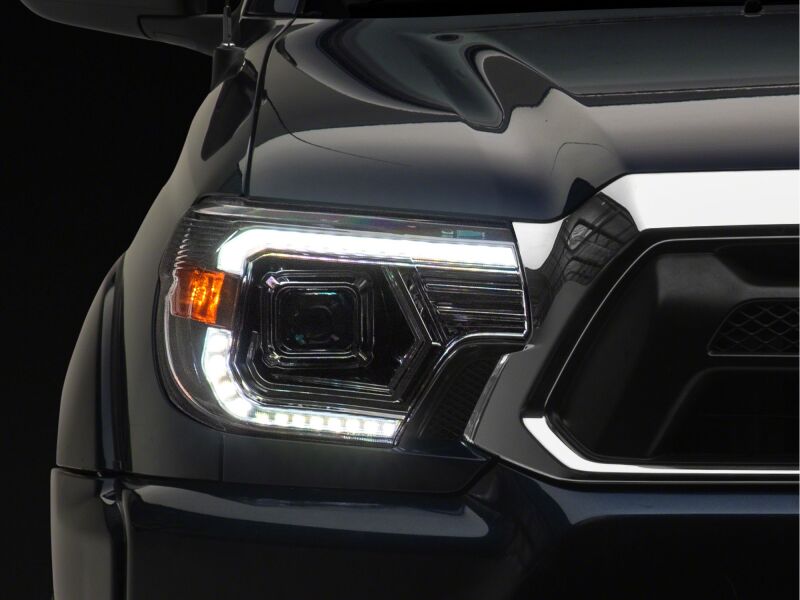 Raxiom 12-15 Toyota Tacoma Axial Series Switchback Projector Headlights- Chrome- Clear Lens - TT23360 - detail view