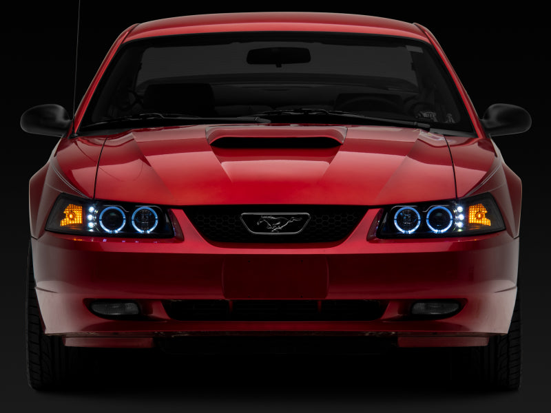 Raxiom 99-04 Ford Mustang Dual LED Halo Projector Headlights- Black Housing (Clear Lens) - 101684