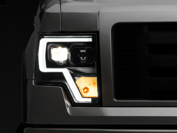 Raxiom 09-14 F-150 Projector Headlights w/ LED Accent- Black Housing (Clear Lens) - T542845 for 2009-2014 Ford F 150 - front 