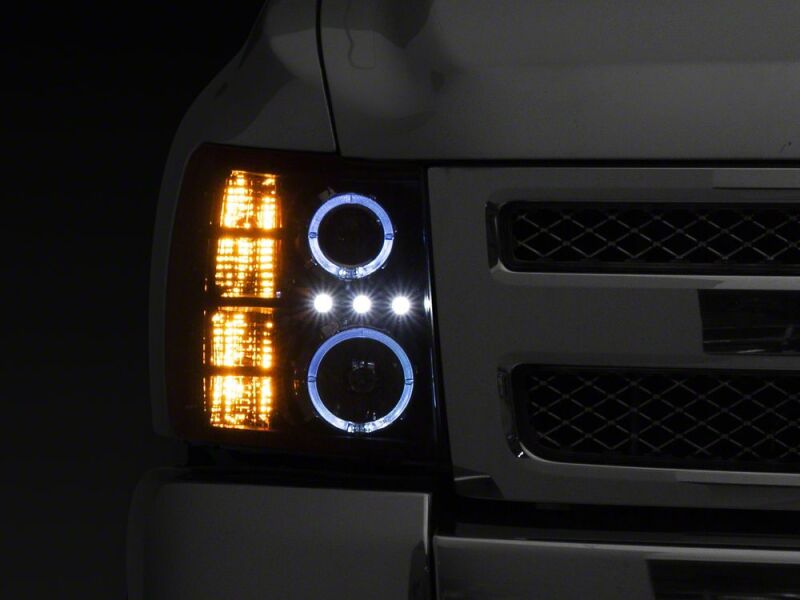 Raxiom 07-13 Chevrolet Silverado 1500 LED Halo Projector Headlights- Black Housing- Clear Lens - S112713 - close-up view 3