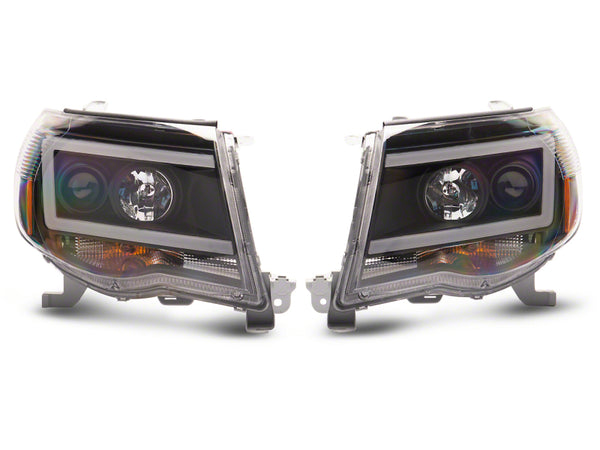 Raxiom 05-11 Toyota Tacoma Axial Series LED DRL Projector Headlights- Blk Housing (Clear Lens) - TT11236 for 2005-2011 Toyota