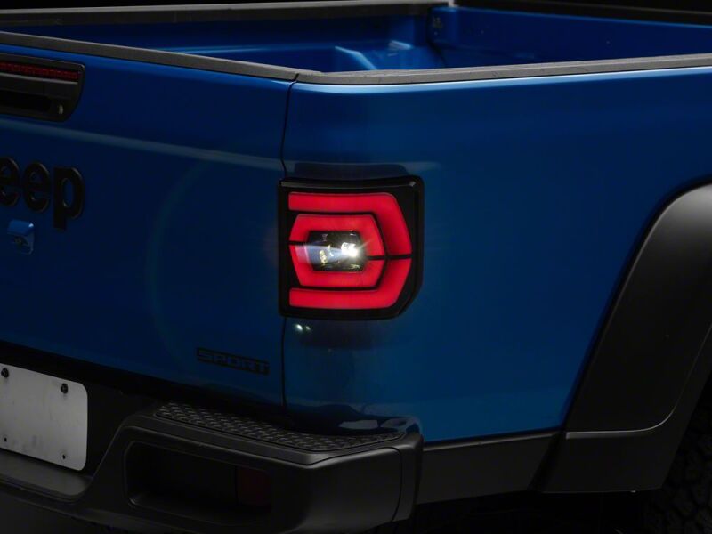 Raxiom 20-26 Jeep Gladiator JT Low Profile LED Tail Lights- Black Housing- Smoked Lens - JG27784 - close-up view 5