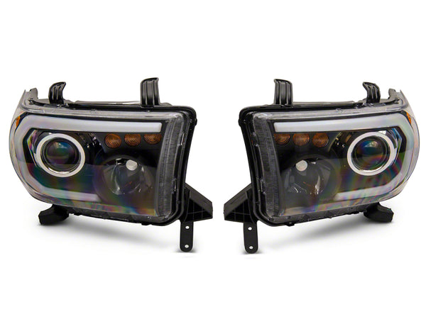 Raxiom 07-13 Toyota Tundra Axial Series Projector Headlights w/ LED Bar- Blk Housing (Clear Lens) - TU16006 for 2007-2013 Toy