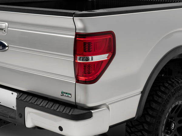 Raxiom 09-14 F-150 Styleside G2 LED Tail Lights- Chrome Housing Red/Clear Lens - T542866 for 2009-2014 Ford F 150 - front vie