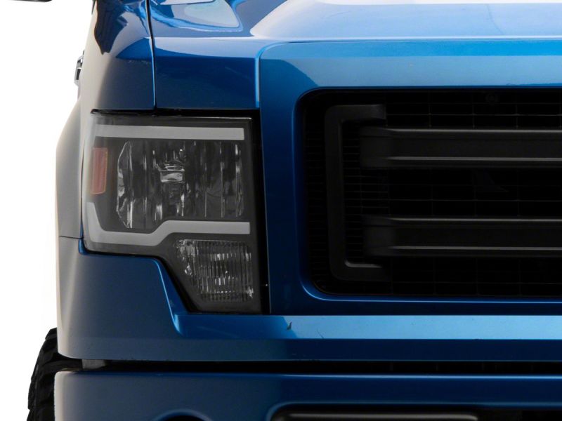 Raxiom 09-14 Ford F-150 Axial Series Headlights w/ LED Bar- Blk Housing (Clear Lens) - T566367