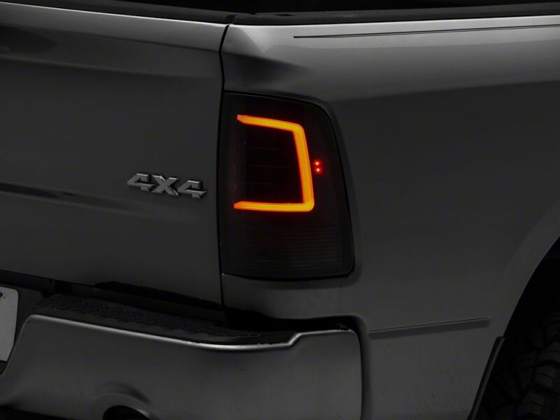Raxiom 09-18 Dodge RAM 1500 Axial Series LED Tail Lights- Black Housing- Smoked Lens - R113540 - front view