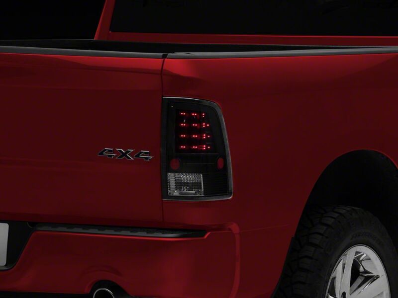 Raxiom 09-18 Dodge RAM 1500 LED Tail Lights- Black Housing- Clear Lens - R110154 - close-up view 5