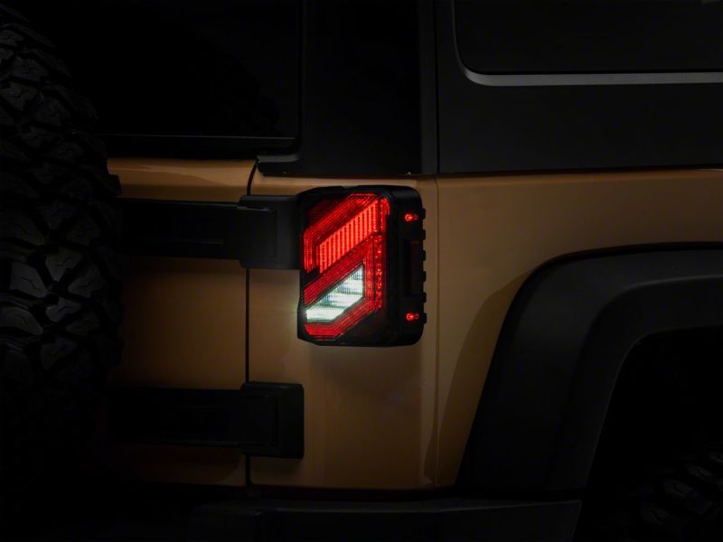 Raxiom 07-18 Jeep Wrangler JK Axial Series Trident LED Tail Lights- Blk Housing (Clear Lens) - J173719