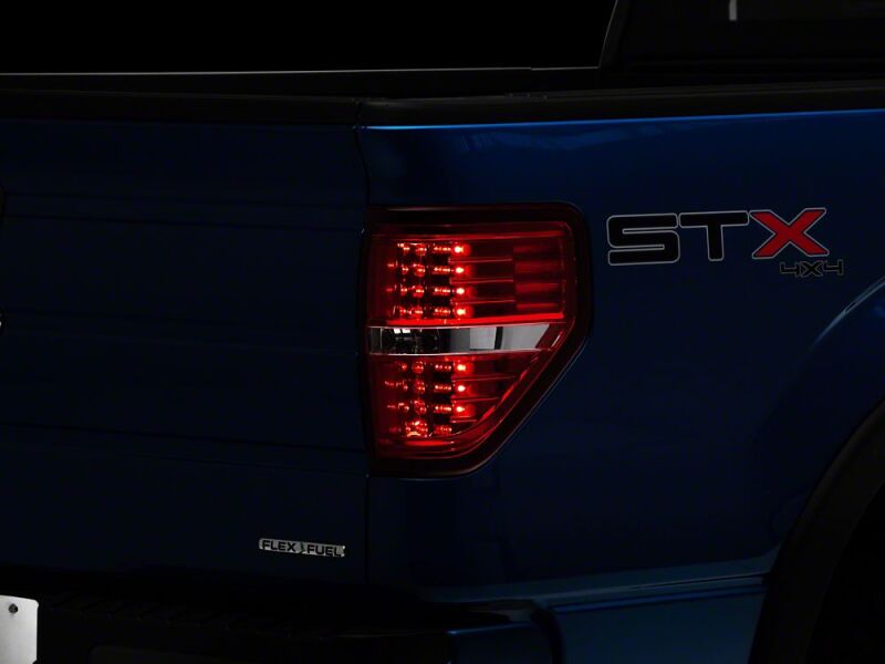 Raxiom 09-14 Ford F-150 Styleside LED Tail Lights- Chrome Housing- Red/Clear Lens - T542869 - close-up view