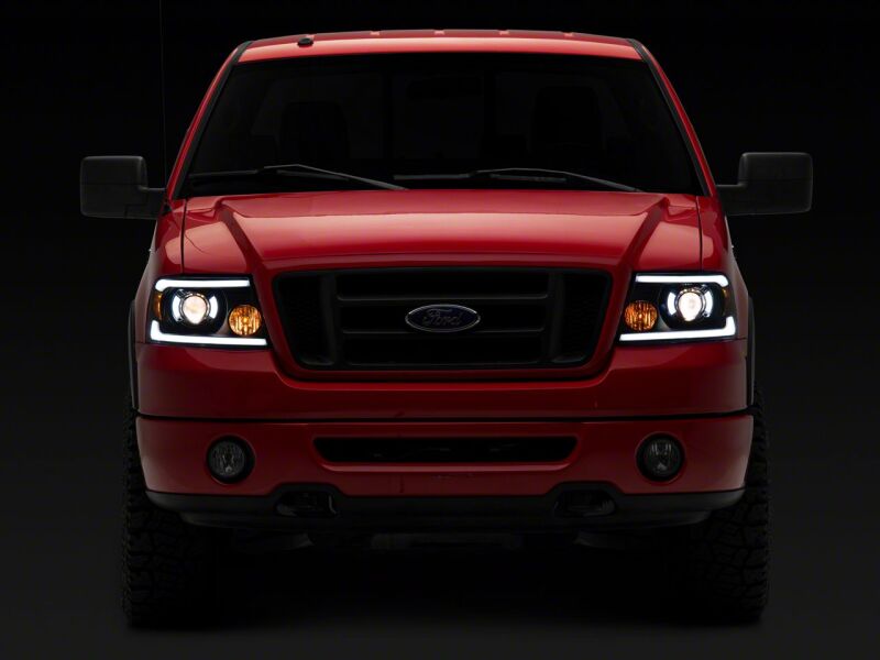 Raxiom 04-08 Ford F-150 Axial Series Projector Headlights with LED Bar- Black Housing- Clear Lens - T566363 for 2004-2008 Ford F 150 - close-up view 4
