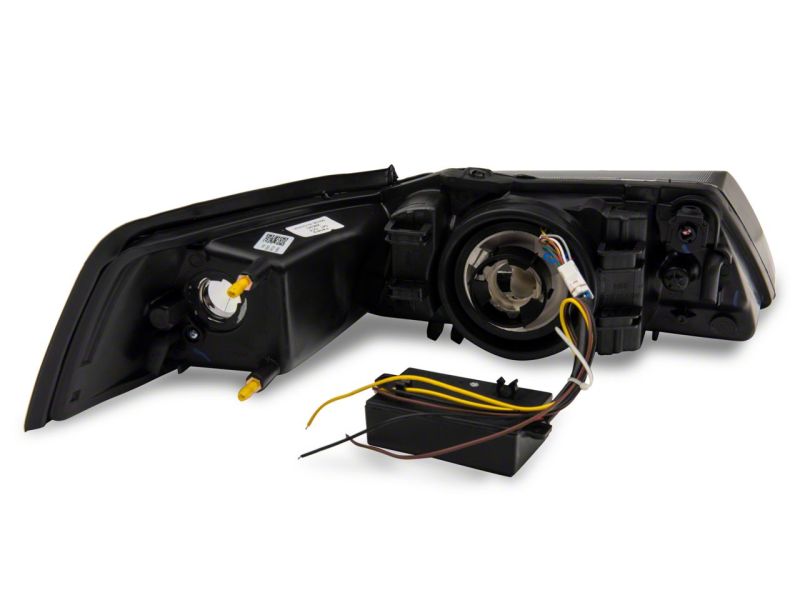 Raxiom 99-04 Ford Mustang Axial Series Headlights w/ Sequential LED Bar- Blk Housing (Clear Lens) - 422713