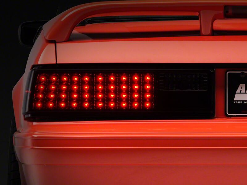 Raxiom 87-93 Ford Mustang Axial Series Smoked LED Tail Lights - 49056 - front view