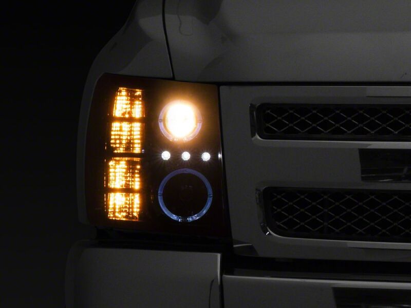 Raxiom 07-13 Chevrolet Silverado 1500 LED Halo Projector Headlights- Black Housing- Clear Lens - S112713 - front view