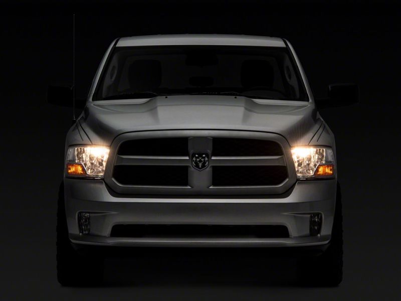 Raxiom 09-18 Dodge RAM 1500 Axial OEM Rep Headlights w/ Single Bulb- Chrome Housing (Clear Lens) - R118018