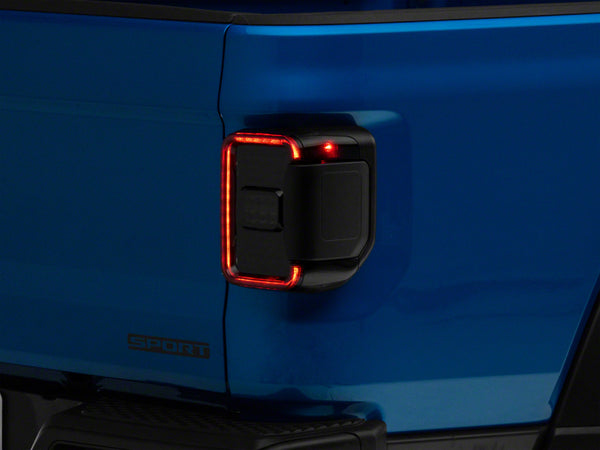 Raxiom 20-23 Jeep Gladiator JT w/ Factory Halogen LED Tail Lights- Blk Housing (Smoked Lens) - JG10490 for 2020-2025 Jeep Gla