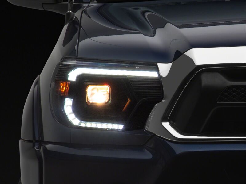 Raxiom 12-15 Toyota Tacoma Axial Series Switchback Projector Headlights- Black Housing- Clear Lens - TT23359 - detail view