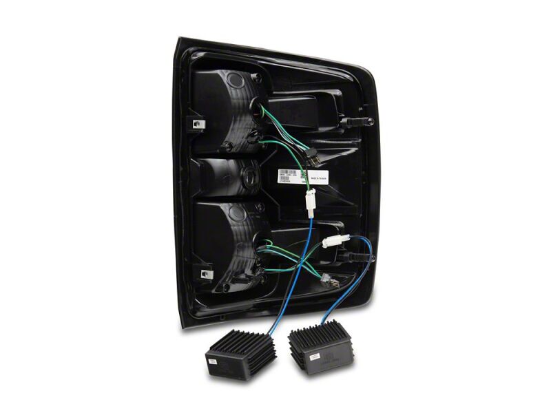 Raxiom 14-18 Chevrolet Silverado 1500 LED Tail Lights/SeqTurn Signals- Chrome- Smoked Lens - S114458 - close-up view 5