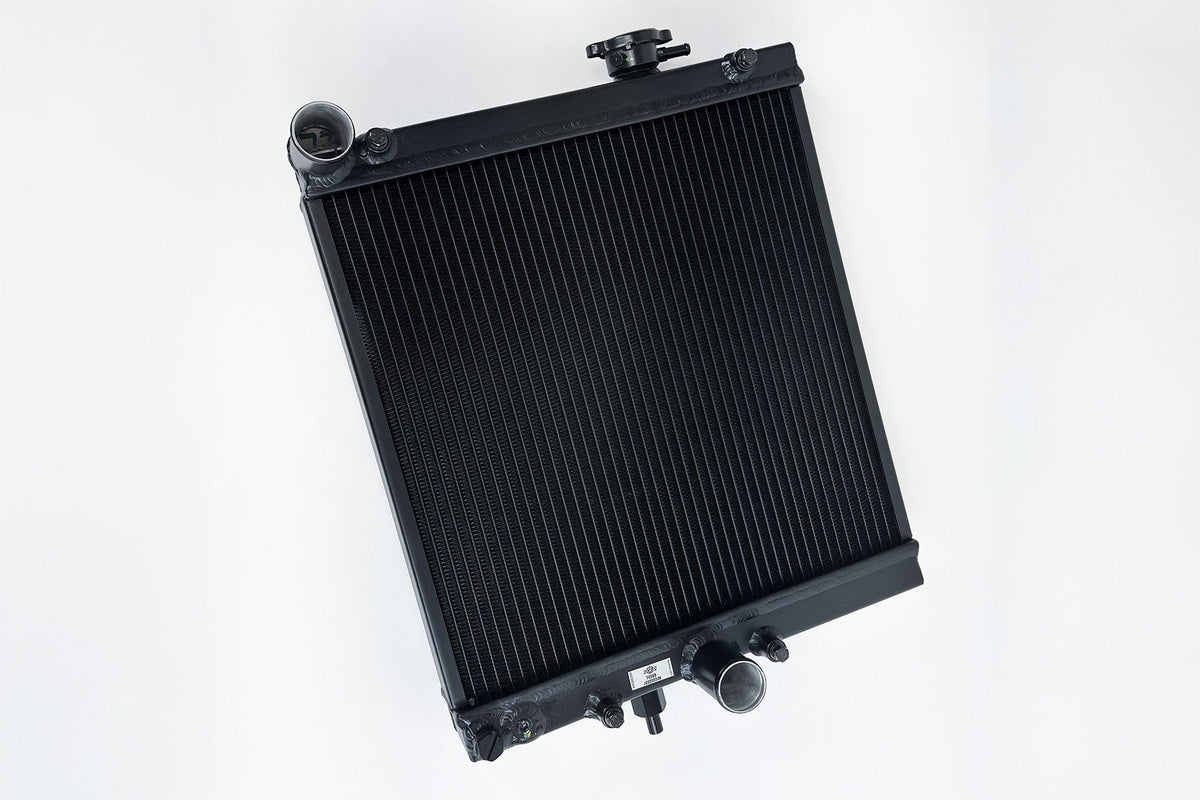 CSF 03-07 Mitsubishi Lancer EVO 7/8/9 1/2 Size Radiator - Black - 7228B