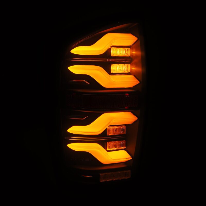 AlphaRex 16-21 Toyota Tacoma LUXX LED Taillights Blk w/Activ Light/Seq Signal - 680090