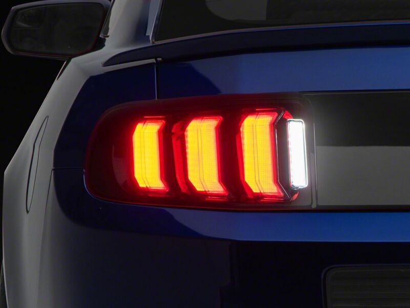 Raxiom 13-14 Ford Mustang CXR Series LED Tail Lights- Black Housing- Smoked Lens - 441705 - close-up view 4